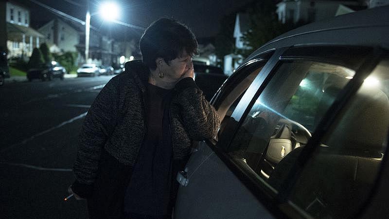 Joanne Enlund stands outside of her vehicle as her son Keith attends his addiction recovery support group meeting in Lehighton. Rick Kintzel / The Morning Call