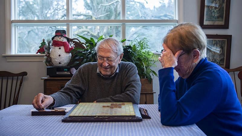 Milton Stemler, 95, smiles as he grabs another letter while playing Scrabble with his wife Jeanne, 91, in their Lower Towamensing Township home. The couple play the game on a daily basis. Rick Kintzel / The Morning Call