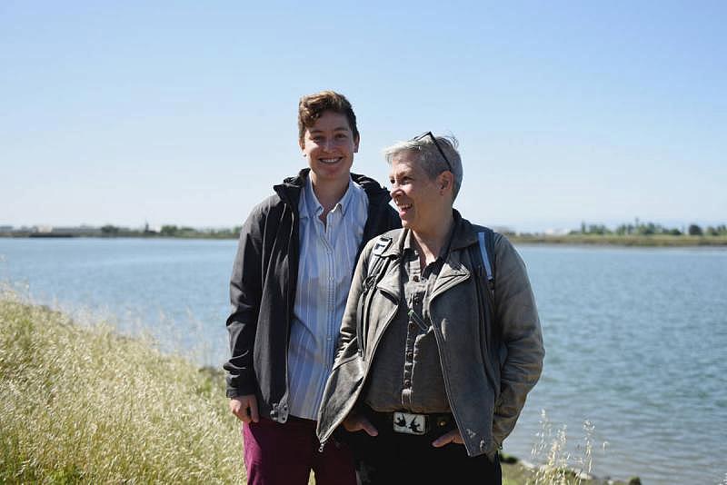 Ellen Plane, left, a grad student at UC Berkeley, and Kristina Hill, associate professor at UC Berkeley of Landscape Architecture & Environmental Planning and Urban Design, at the Martin Luther King Jr. Regional Shoreline in Oakland, Calif. (Lauren Hanussak/KQED)