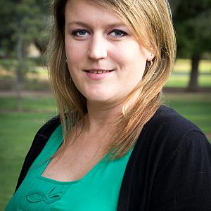 Portrait photo of journalist, Caitlin Schmidt.