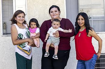 From left, Gladis, Mary and Nancy spoke to Fellows taking part in the 2026 National Fellowship during a field visit to the housing complex where they now live. 