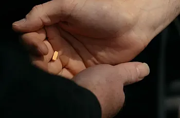 handing pills