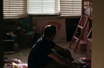 A men sitting in the room 