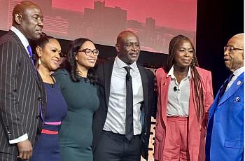From left, attorney Ben Crump, moderator Tiffany Cross, Christine Wells-Wonsley, Elmore Wonsley, NABJ president Errin Haines, and the Rev. Al Sharpton onstage at the National Association of Black Journalists convention in Atlanta on Aug. 13.