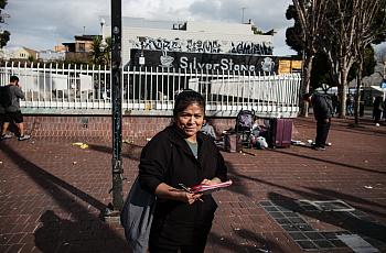 Woman waiting at bus stop