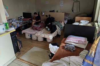 A room with beds