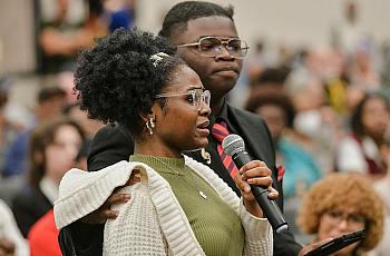 Students speak in opposition to a proposal by Elon Musk's xAI to run gas turbines at a new data center in Memphis, Tennessee, during a public comment meeting.
