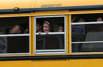 Students ride the bus in Baltimore, Maryland.