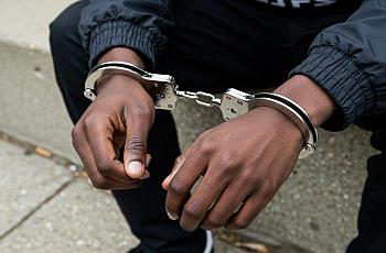 Hands in handcuffs