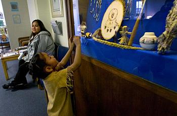 Child looking up at souvenir