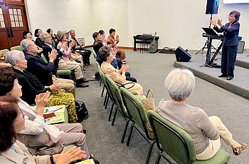 group of people listening