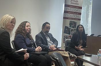 Panelists sit before a table at the 2024 California Health Equity Fellowship in Los Angeles on March 13.