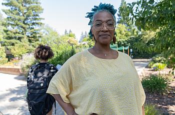 a woman facing forward