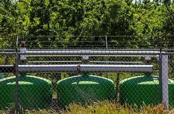 An irrigation system next to an orchard