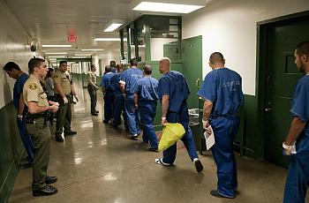 Image of people walking in jail