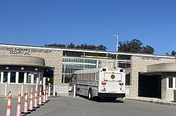 A bus near a building entrance