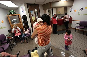 Room full of people and babies