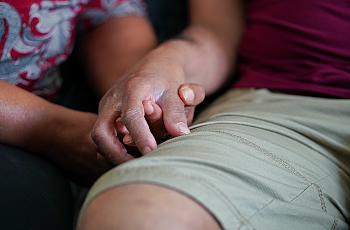 Hands intertwined