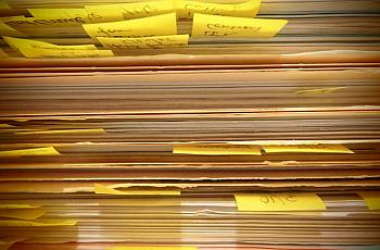 Stack of files with papers in files