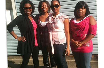 4 people standing together