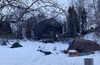 Image of encampment in a snowy region