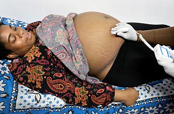 Pregnant person getting medical care