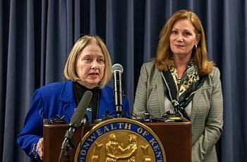 Two women speaking in a press conference