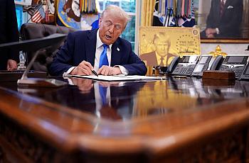 Person signing a document in office