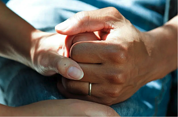 Person holding other person hand