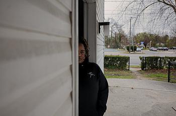 person standing in a doorway