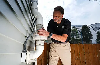 A person looking at an installation