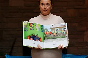 Person holding a book