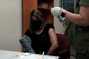 Person sitting for treatment