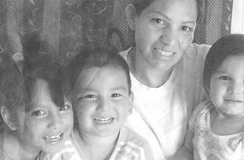 Old photograph of 4 people