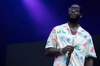 Person with pic in hand and a purple background