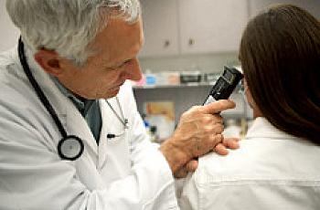Doctor examining patient