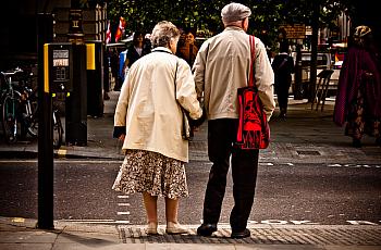 Elderly people crossing the street