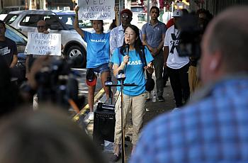 Sookyung Oh spoke in July about language access problems during the Unemployment Action Coalition’s protest against the Virginia