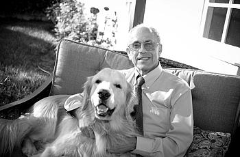 Dr. Joe Blum, relaxing at home with his dog, Cody, has worked with Veterans Affairs patients for nearly 30 years and acknowledge