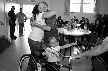 Casa Serena executive director Craig Belknap gets a hug from a grateful Santa Barbara County Sheriff’s Treatment Program graduat