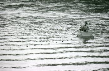 A local fishermen uses a gill net on the Klamath River in this 1978 photo.