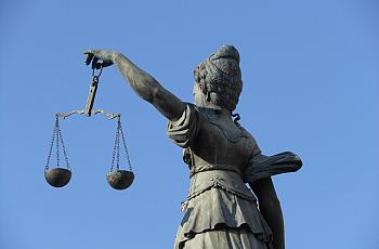 Lady justice can be a health reporter's best friend.