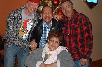 Ed Harbur, Dave Gonzalez and Gustavo “Sky” Gonzalez with the Gonzalez’s mother, Evangelina. Evangelina became infected with COVI