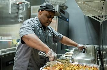 Raymond Galloway, a line cook at a Chicago soul food restaurant, wasn’t able to work regularly for about six months because of l