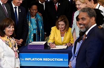 Speaker of the House Nancy Pelosi signs the Inflation Reduction Act after the House voted 220-207 to pass it at on August 12, 20