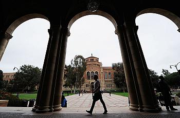 Student walking on college campus