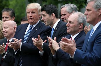 Trump and Paul Ryan applaud 