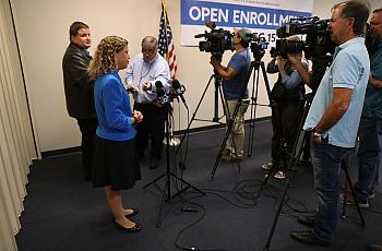Rep. Debbie Wasserman Schultz (D-FL) talks to reporters Tuesday at a press conference about the Affordable Care Act in 