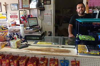 Ernesto Carrillo owns Carrillo's Mexican Store in Redding. He's one of the few people in Shasta County translating information.