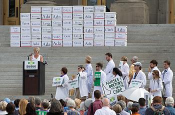 State Rep. Christy Perry (R) and volunteers deliver petitions to the state on July 6, 2018.